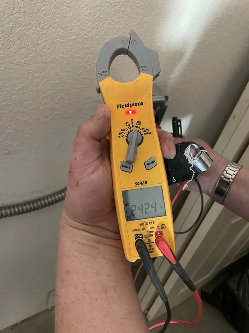 Voltage testing with clamp meter during Hot Tub / Pool Electrical Wiring in Dunkirk
